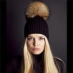 Beanies with fur poms