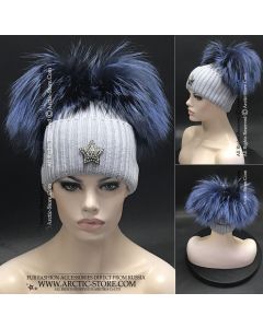 women beanie in light aurora color with two big blue fox fur pompoms